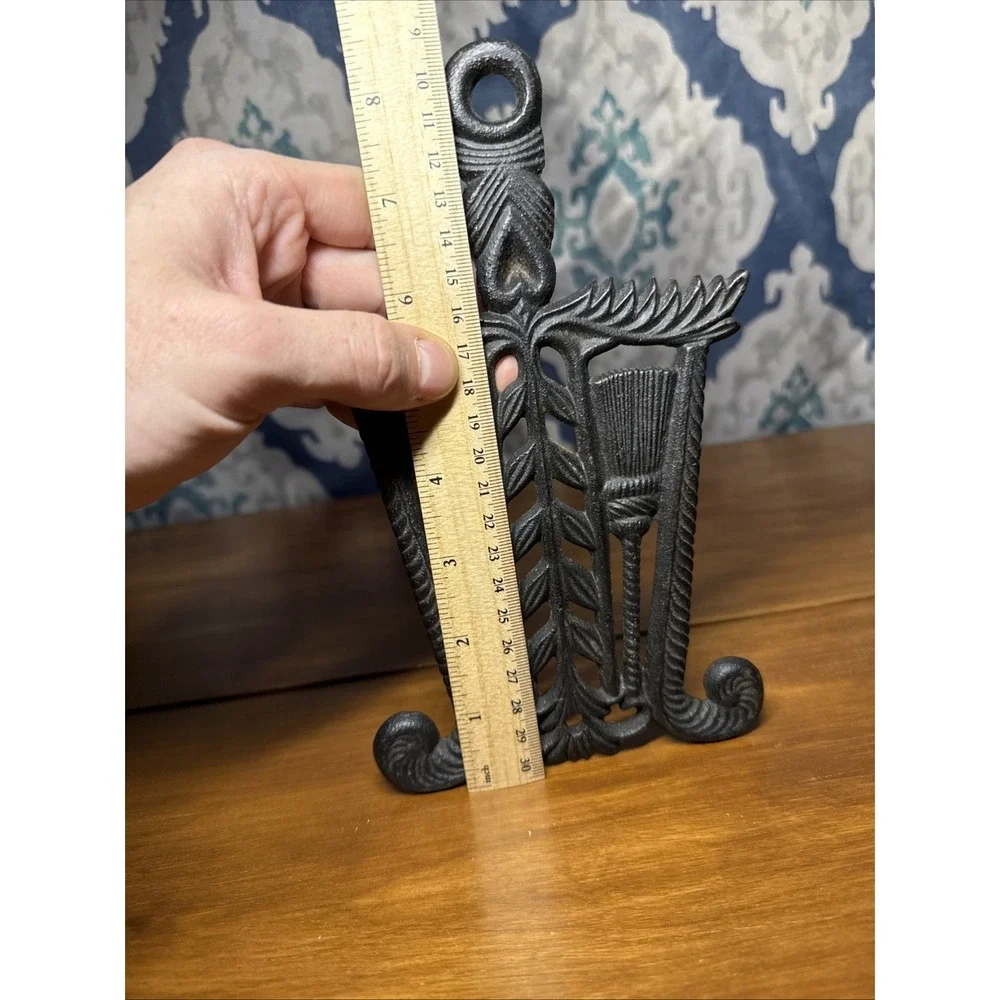 Vtg VM Tassel & Broom  Pennsylvania Dutch Style Cast Iron Trivet 8 5/8